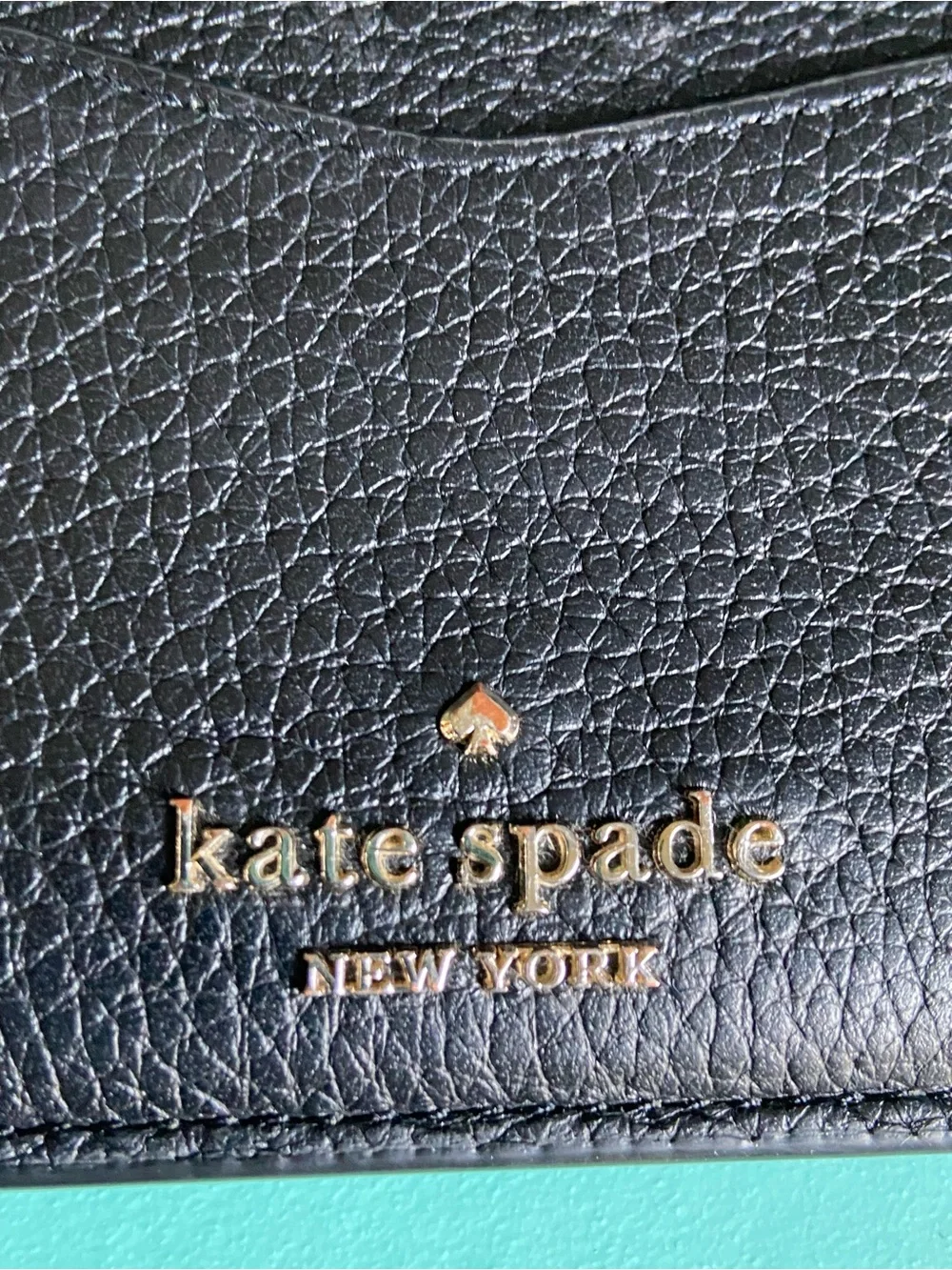 kate spade Black Pebbled Leather Zip Wristlet with Gold Logo